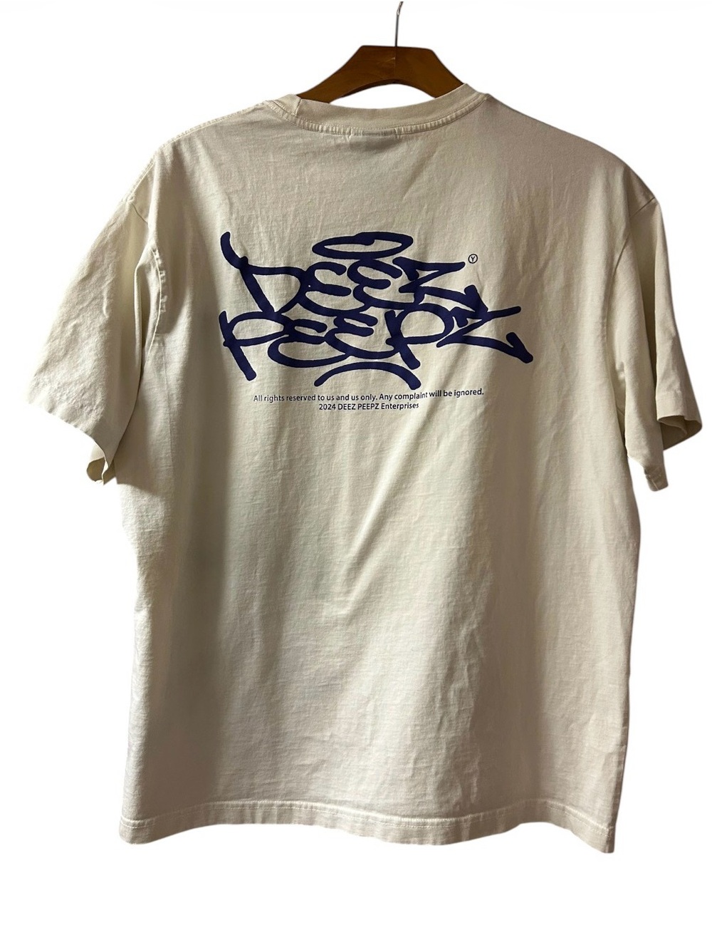 H&M x OZEE PEEPS collab tee with graffiti-style text graphic
Size L